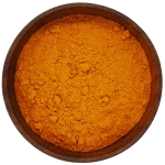 Ground turmeric in bowl